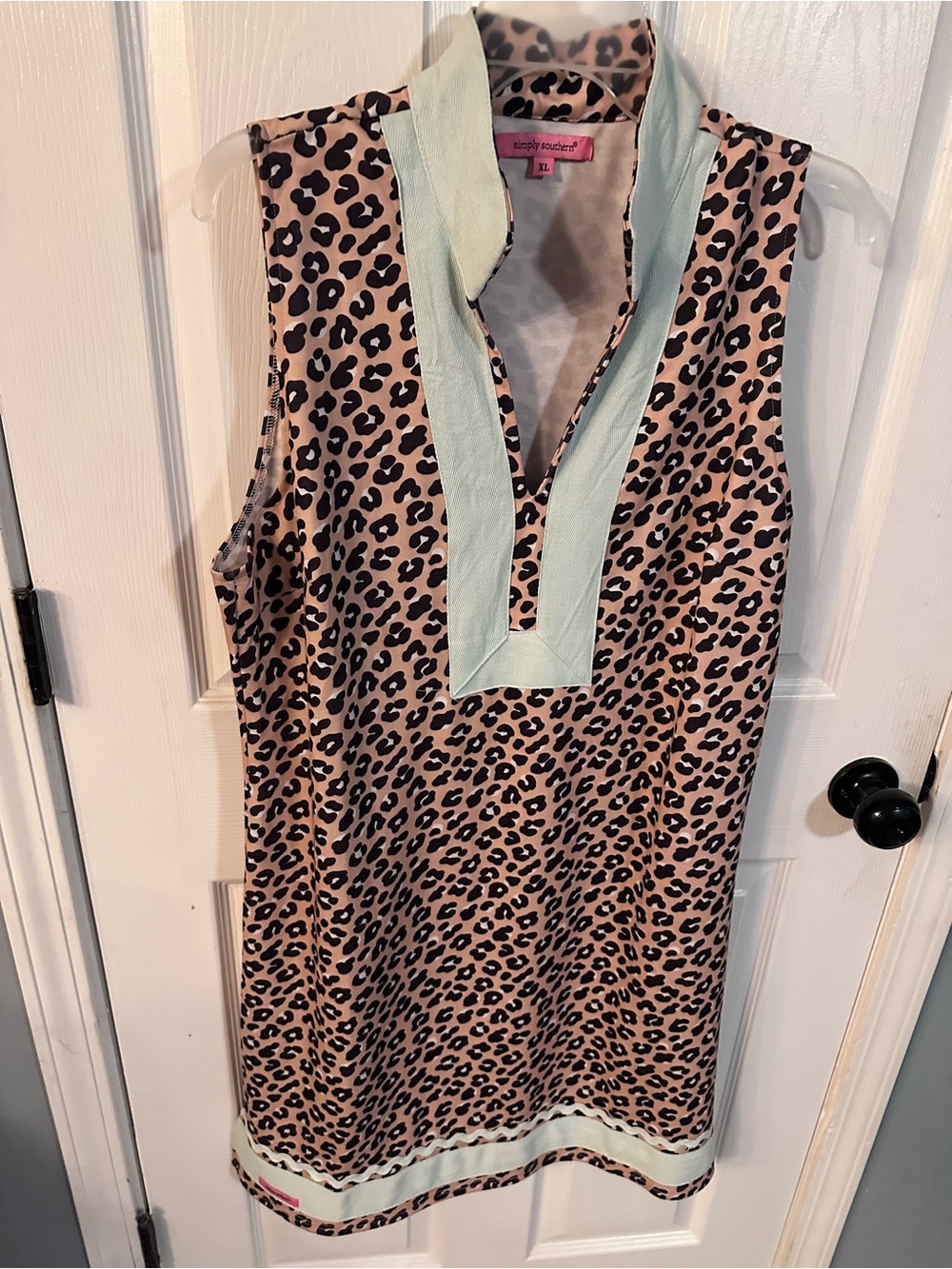 Sleeveless simply southern Leopard Print Shift Dress with Mint/aqua Trim